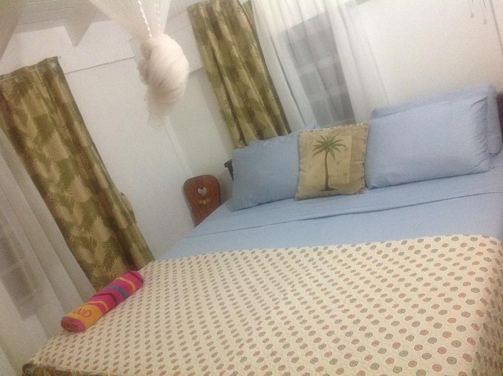 Rainbow Beach Apartments & Rooms Calibishie Szoba fotó